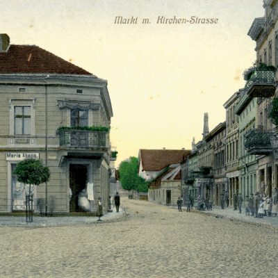 Rynek. Wlot w ul. Kościelną (ok. 1910 r.) - pocztówka kopia